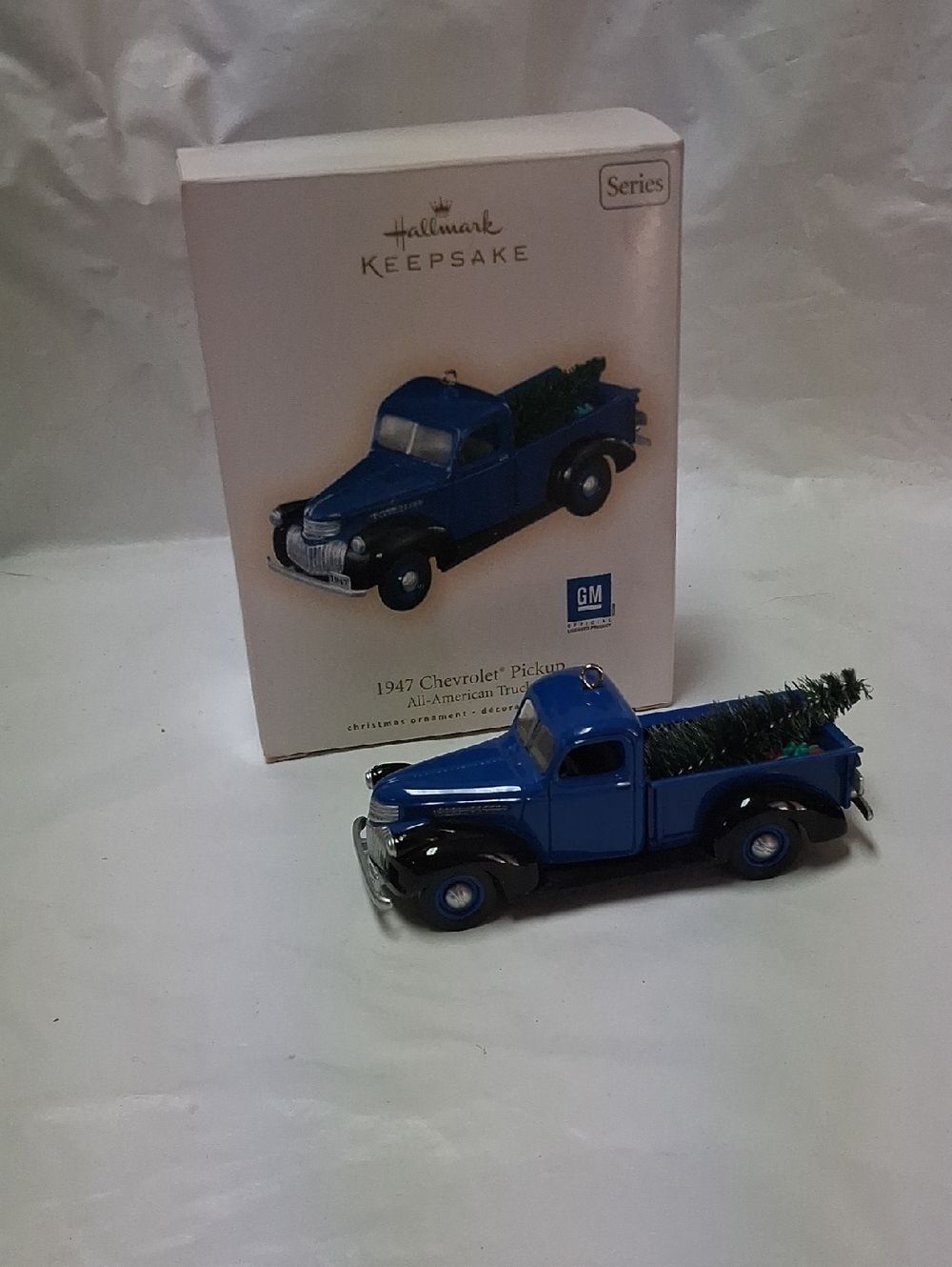 New Hallmark Blue 1947 Chevrolet Pickup Ornament with Green Tree
